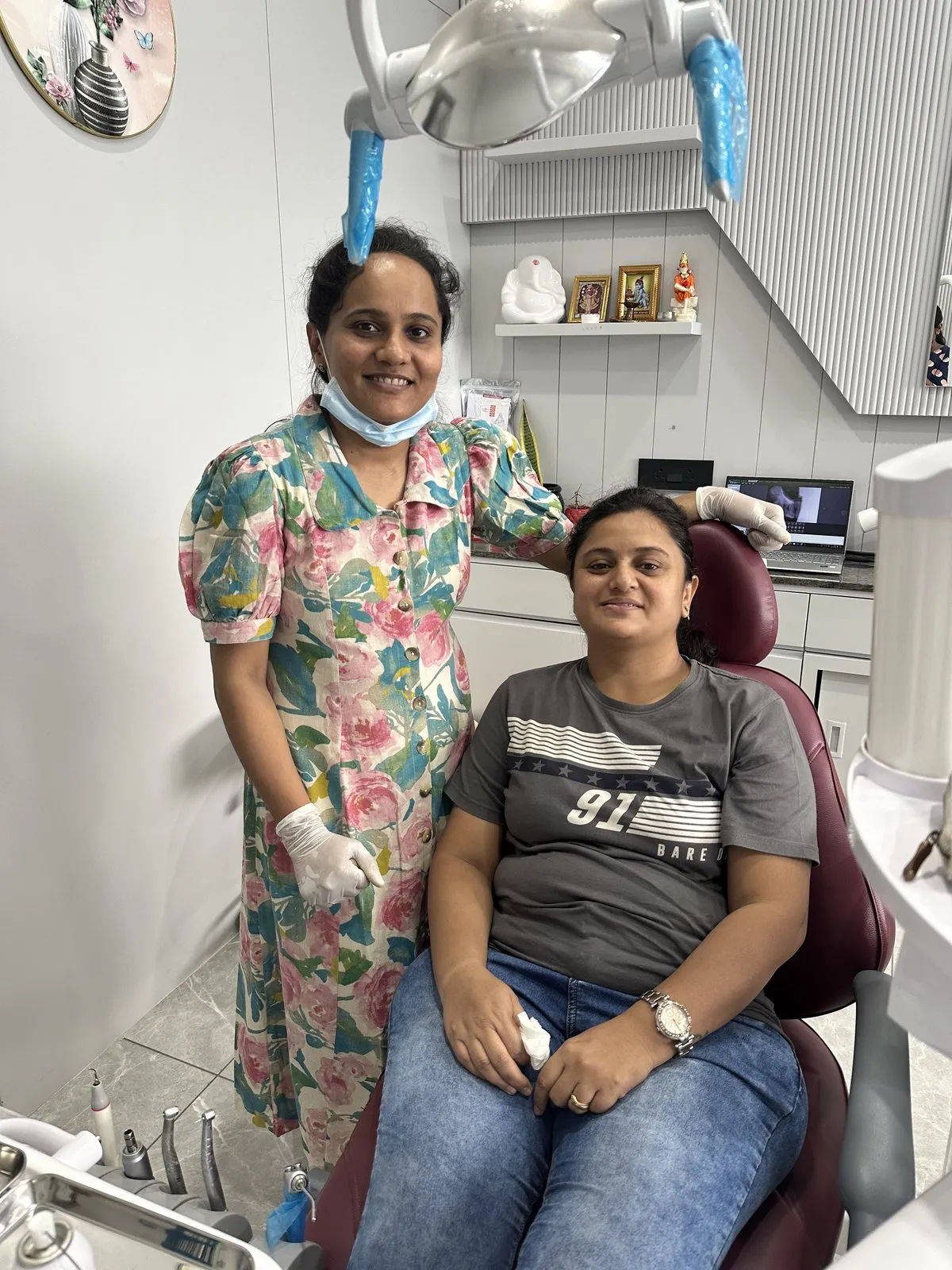 Dr. Rima Shah with a smiling patient at Anaya Dental Clinic